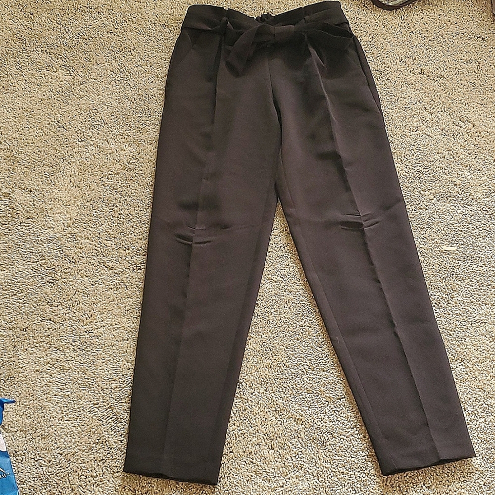 Black slacks with side pockets